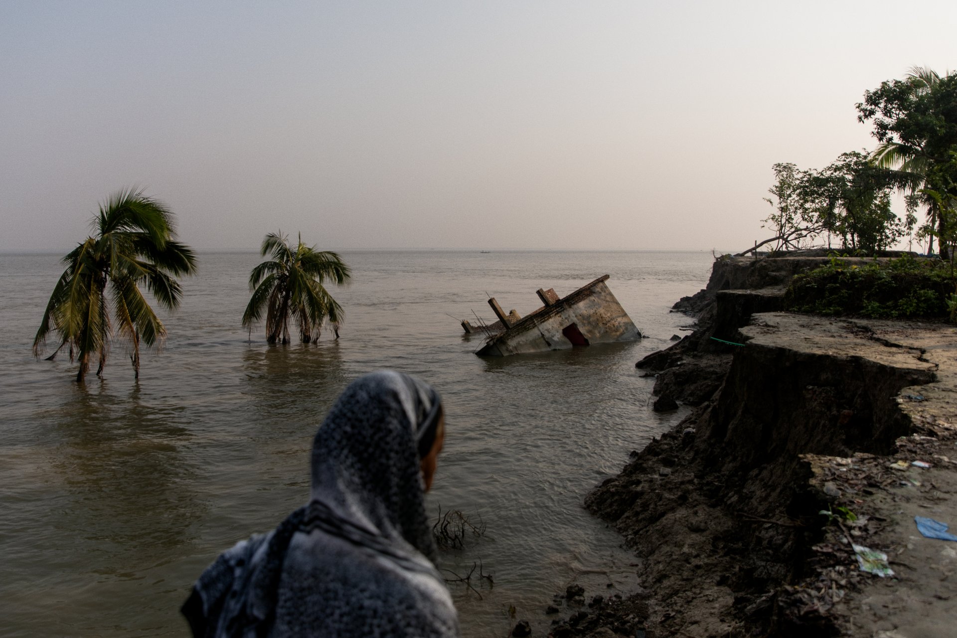 House submerged in Padma river because of land erosion