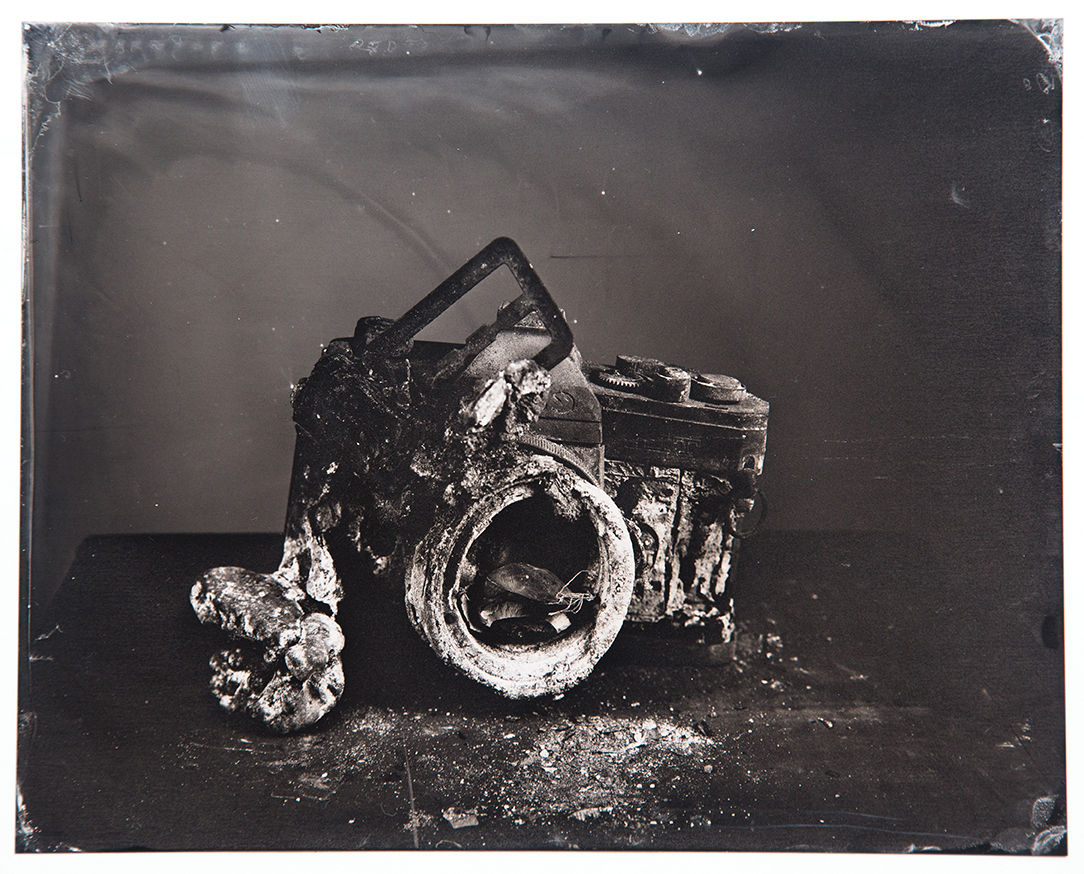 Tintype of a camera destroyed by a wildfire in California.