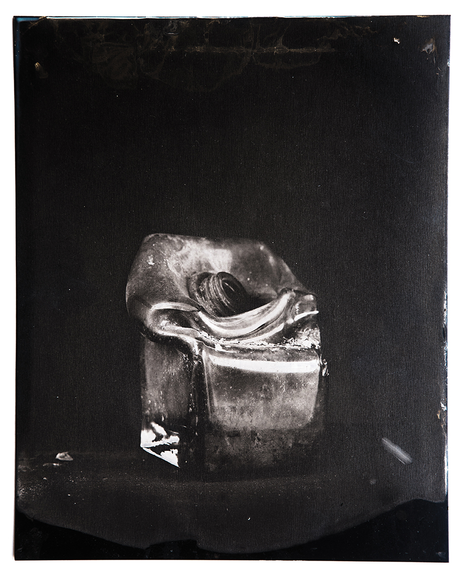 Tintype of a glass vase destroyed by a wildfire in California.
