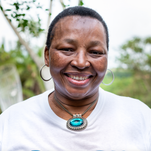 Nomathamsanqa Majozi, the Head of Public Engagement at Africa Health Research Institute, is pictured smiling directly at the camera.