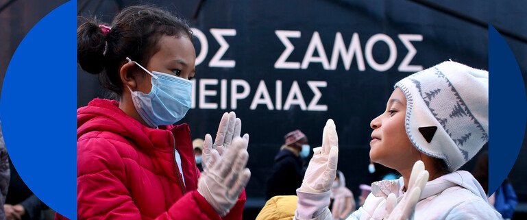 Migrant children from the Moria camp in Lesbos island wearing masks to prevent the spread of the coronavirus, playing. Composite image.