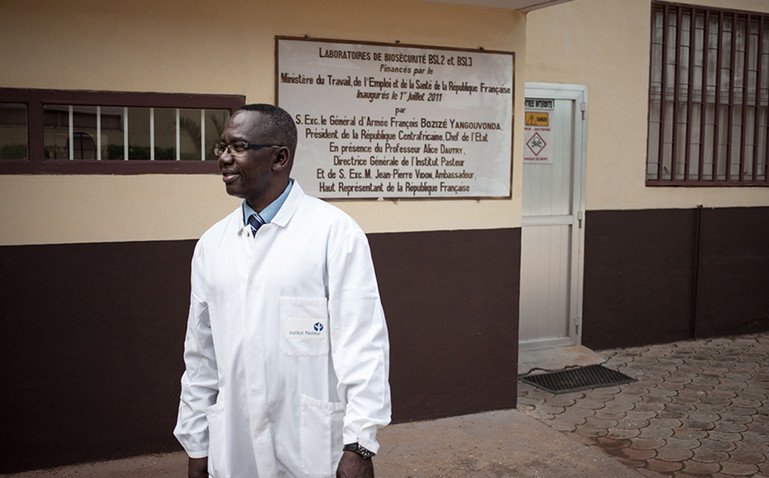 Dr Emmanuel Nakoune stands outside research laboratory in the Central African Republic