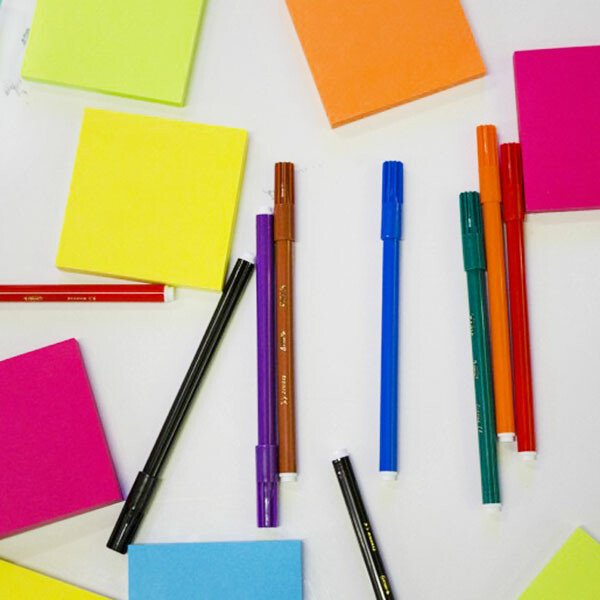 Image of pens and sticky notes