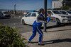 A learner shoots footage in a carpark during a creative documentary making workshop.