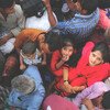 A group of men, women and children in Bangladesh.