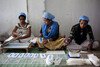 Women working at the Sanitary Pad Unit on the Amgoorie Tea Estate in Assam, India. 